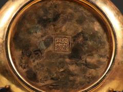 清 铜鎏金龙凤纹赏盘。 规格：口径18cm 重773g 鎏金龙凤赏盘，精料细工，精美绝伦，纹饰精美，工艺精湛，盘中纹龙凤纹，寓意好，底部落款“乾隆年制”，鎏金厚重，收藏极品。