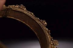 清代，银鎏金掐丝双龙戏珠手镯 规格：高2.5cm直径10cm重93g 藏品以纯银制、器体鎏金工艺、工艺精湛，錾刻双龙戏珠纹饰，做工精细考究，金水保存完好，佩戴效果极佳。品相一流，值得收藏。2