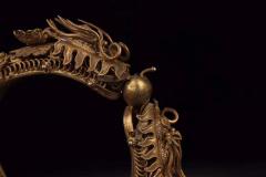 清代，银鎏金掐丝双龙戏珠手镯 规格：高2.5cm直径10cm重93g 藏品以纯银制、器体鎏金工艺、工艺精湛，錾刻双龙戏珠纹饰，做工精细考究，金水保存完好，佩戴效果极佳。品相一流，值得收藏。2