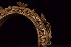 清代，银鎏金掐丝双龙戏珠手镯 规格：高2.5cm直径10cm重93g 藏品以纯银制、器体鎏金工艺、工艺精湛，錾刻双龙戏珠纹饰，做工精细考究，金水保存完好，佩戴效果极佳。品相一流，值得收藏。2